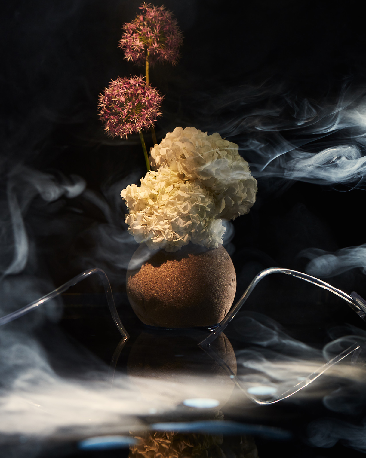 Still life flowers with smoke